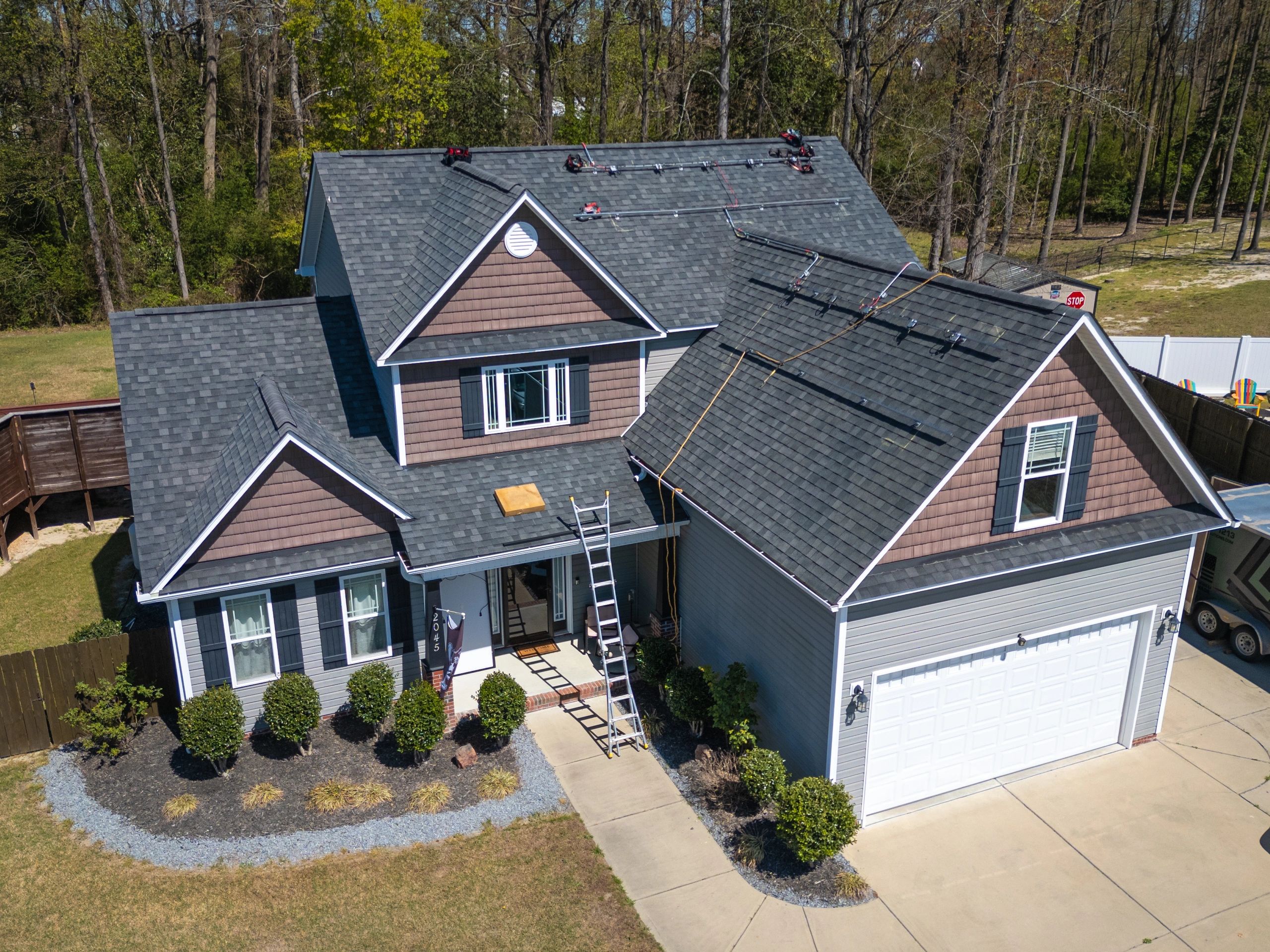 Residential roof exterior representing storm damage response
